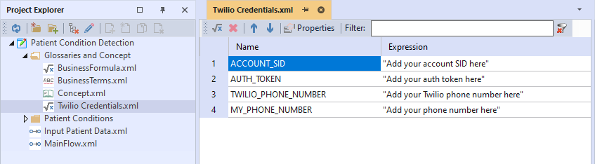 Project Explorer view showing the logic documents in the project and the Twilio Credentials.xml selected. In the editor view is the Business Formula view showing the Twilio credentials parameters